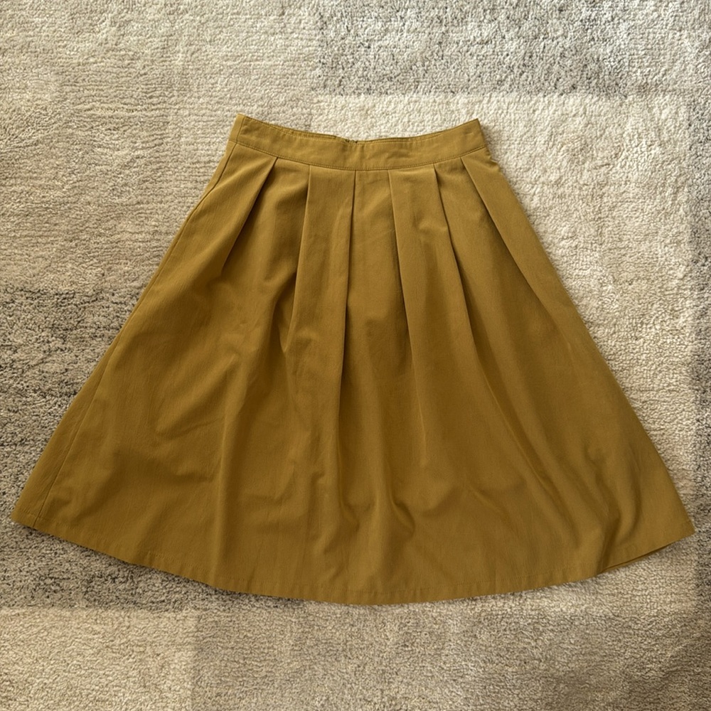NWOT A-line midi skirt, knee length, color mustard, size S